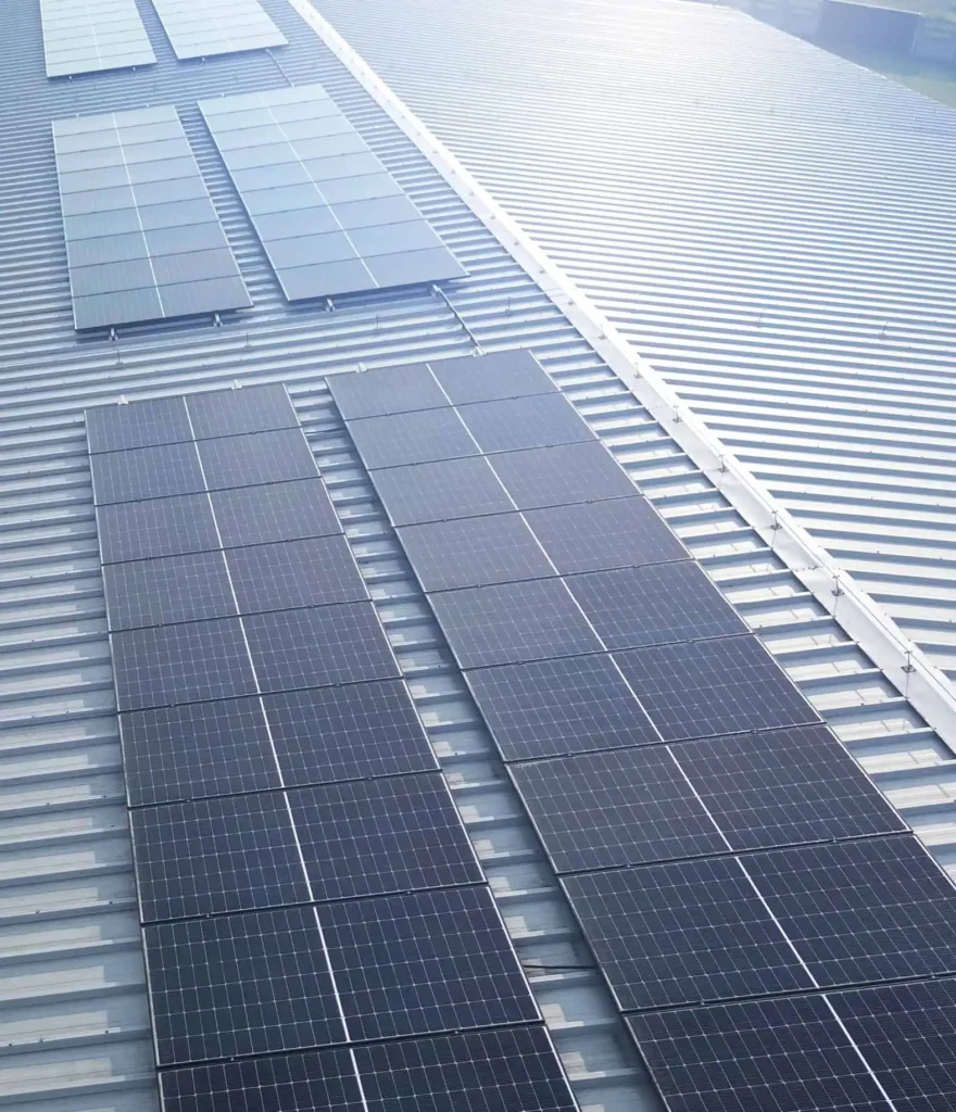 Solar panels installed on corrugated metal industrial roof