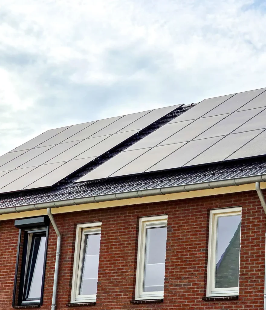 Solar panels installed on brick house roof